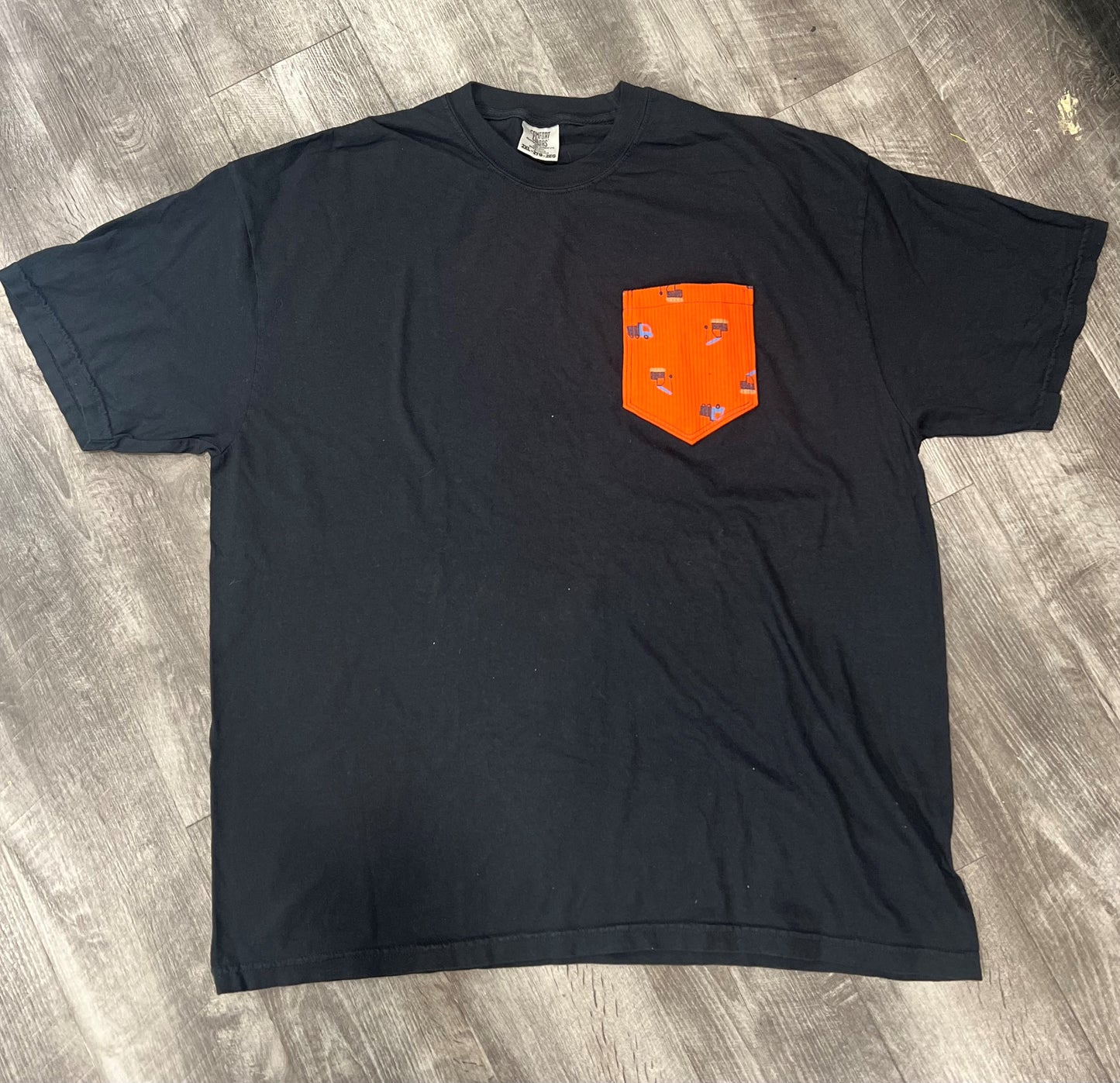 Unisex Keepsake Pocket T-shirt with Baby Clothes