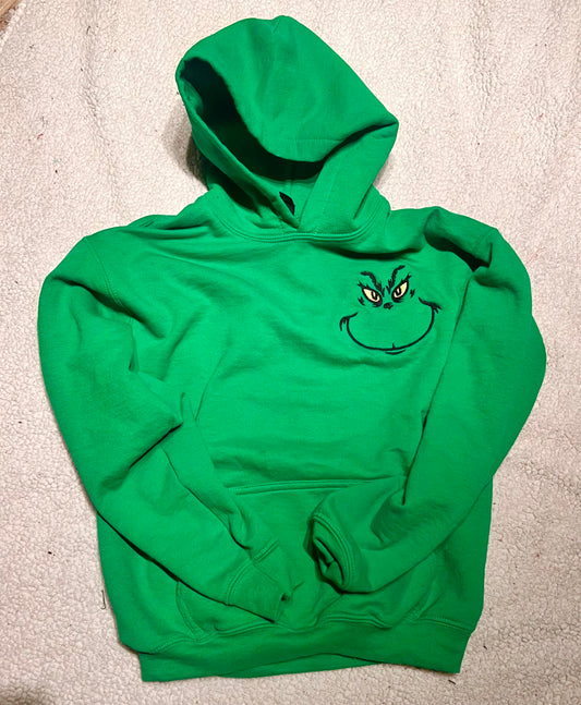 Green hoodie with a face design left chest 
front view 
christmas sweatshirt hoodie